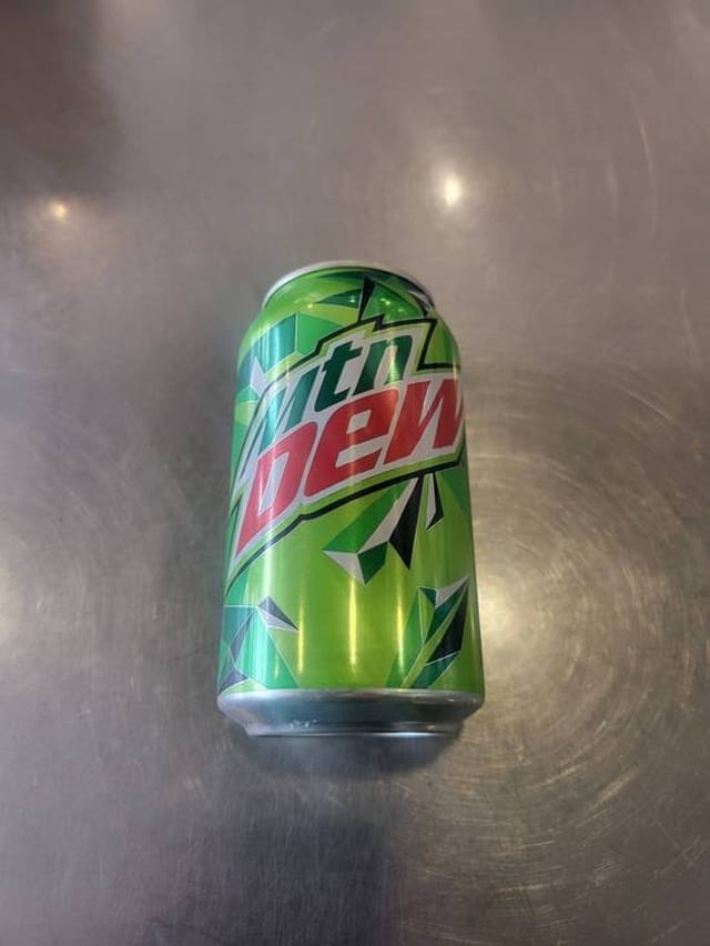 12 OZ MOUNTAIN DEW CAN.