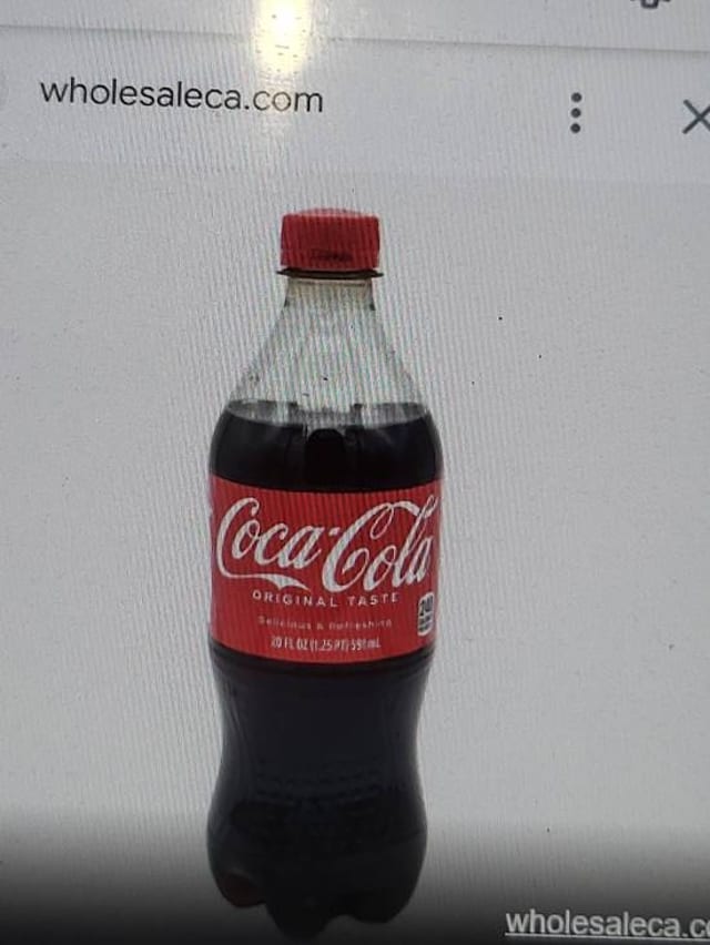 20 OZ COKE CLASSIC.